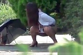 Spex asian pees in park - free porn video