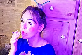 Japanese Stepsister Smokes A Cigarette - free porn video